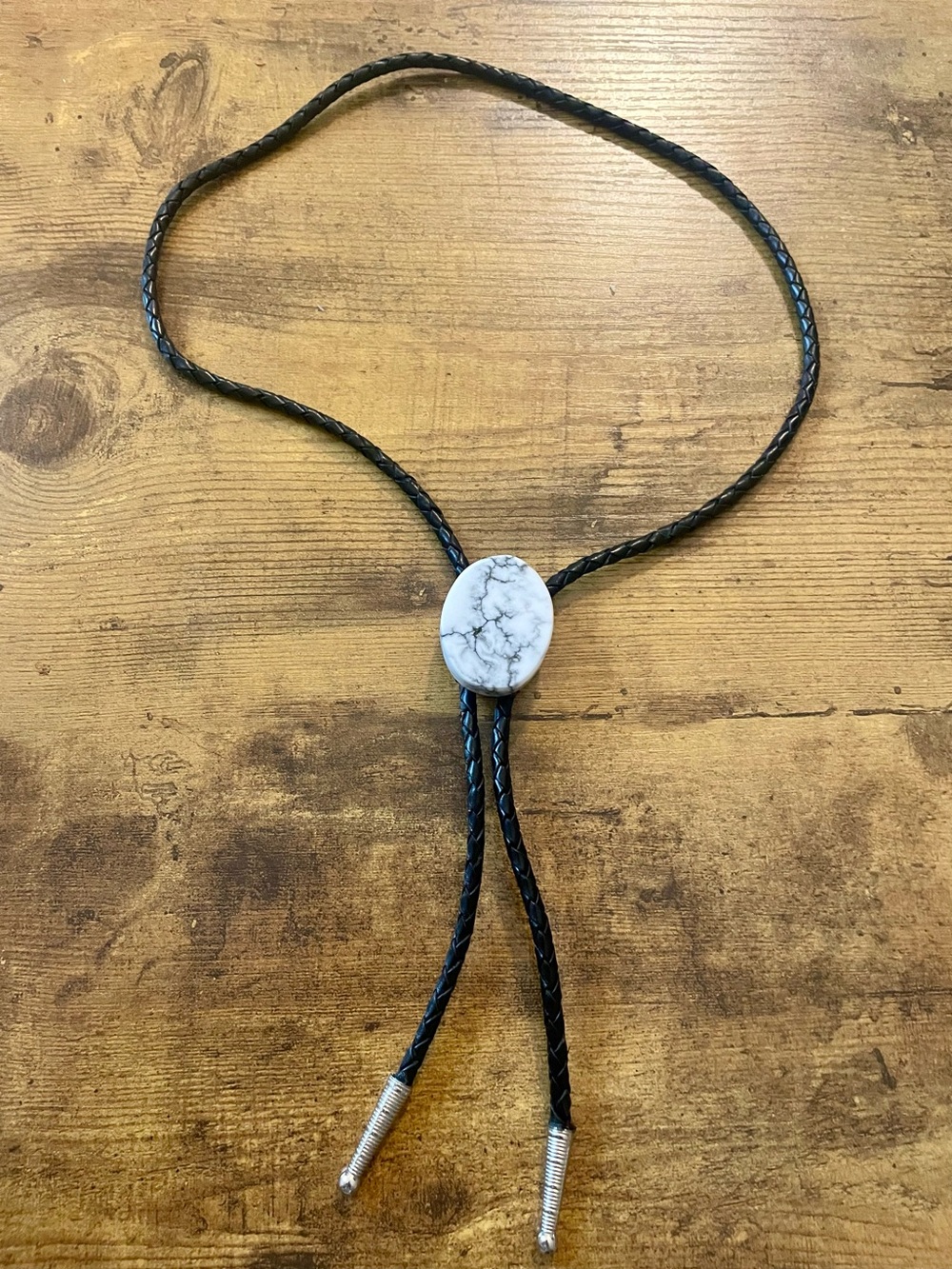 Handcrafted Lapidary: Bolo Tie with Howlite Stone Accent on Braided Leather Cord